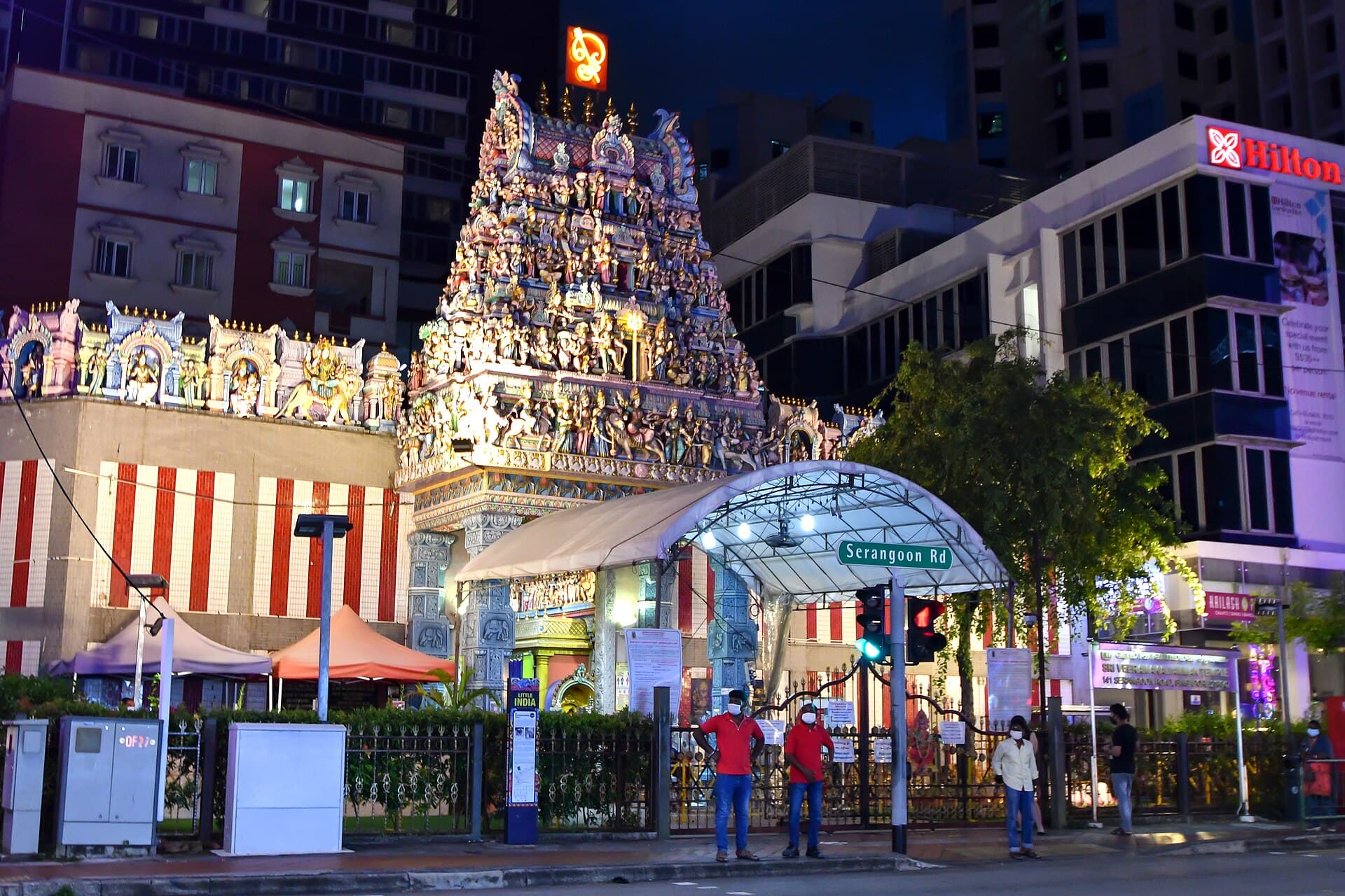 The colourful gopuram of Sri Veeramakaliamman Temple on Serangoon Road, with sculpted deities stacked above the entrance