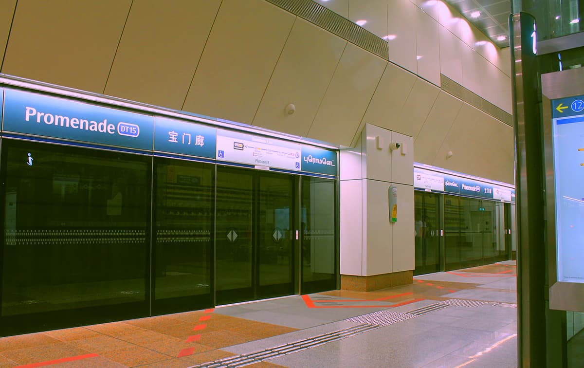Platform of Promenade MRT station with train doors open